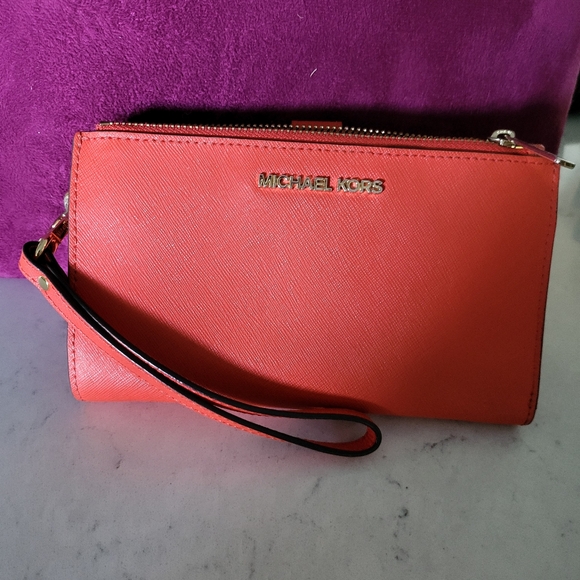 Michael Kors Handbags - Michael Kors Orange Wristlet